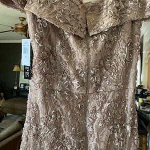 XSCAPE taupe gown size 8 NWT.Great dress for a mother of the bride or groom.